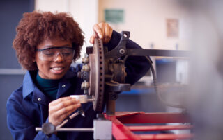 Student working on machinery